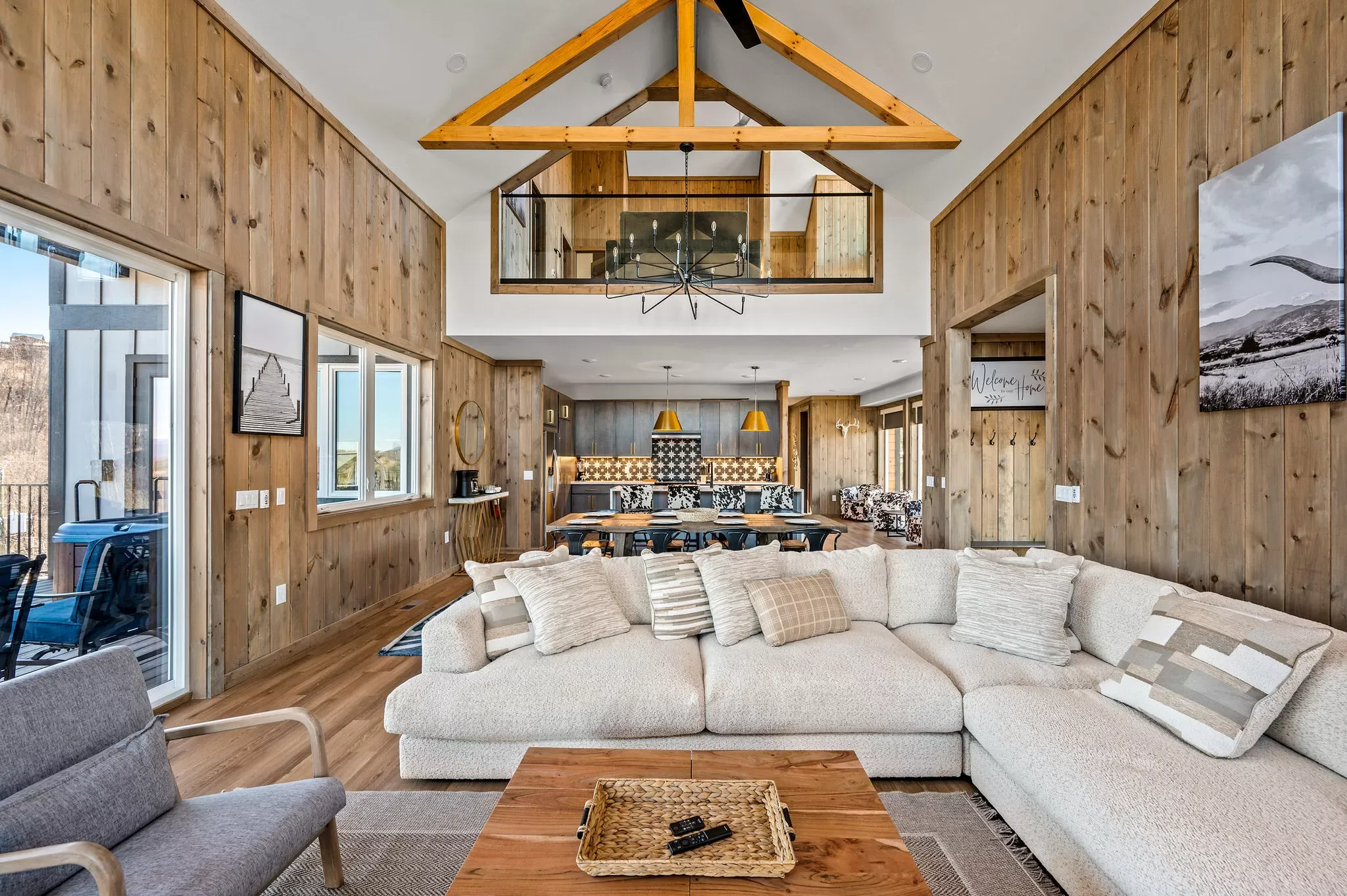 Great room with vaulted ceilings and mountain-facing windows